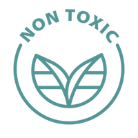 A teal circular graphic with the words 'NON TOXIC' arched over a stylized leaf emblem on a white background.