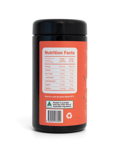 Black container with red label on a white background